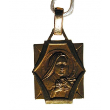 3 médailles de Ste Thérèse de l'Enfant Jésus.