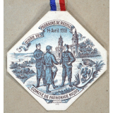 Insigne de quête pour la reconstitution des foyers détruits par la guerre. 