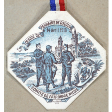 Insigne de quête pour la reconstitution des foyers détruits par la guerre. 
