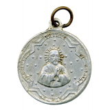 Médaille religieuse à l'effigie de la Vierge et de saint Joseph. 