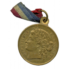 Médaille du Sou des Écoles Laïques de Menton. 
