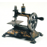 Machine à coudre miniature. 