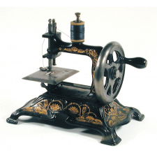 Machine à coudre miniature.