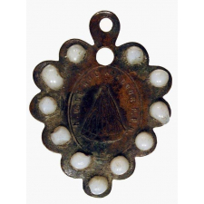 Médaille religieuse à l'effigie de Notre-Dame de Rocamadour.