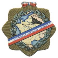 Insigne de quête de la journée des Régions Libérées. 