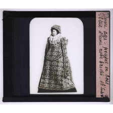 Jeux du jeune âge. Poupée en bois vêtue d'une robe brodée, 16e siècle.