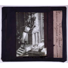 Guerre de Cent ans. Saint-Denis. Jeanne suspend son armure.
