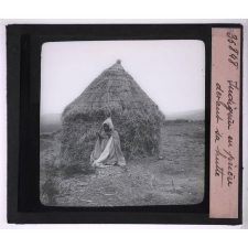 Habitation, maisons, hors série. Indigène en prière devant sa hutte.