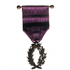 Palmes d'officier d'Académie.