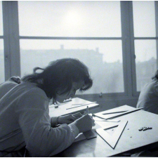Lycée technique Jacquard : cours de dessin industriel. Elève électricienne de première année.
