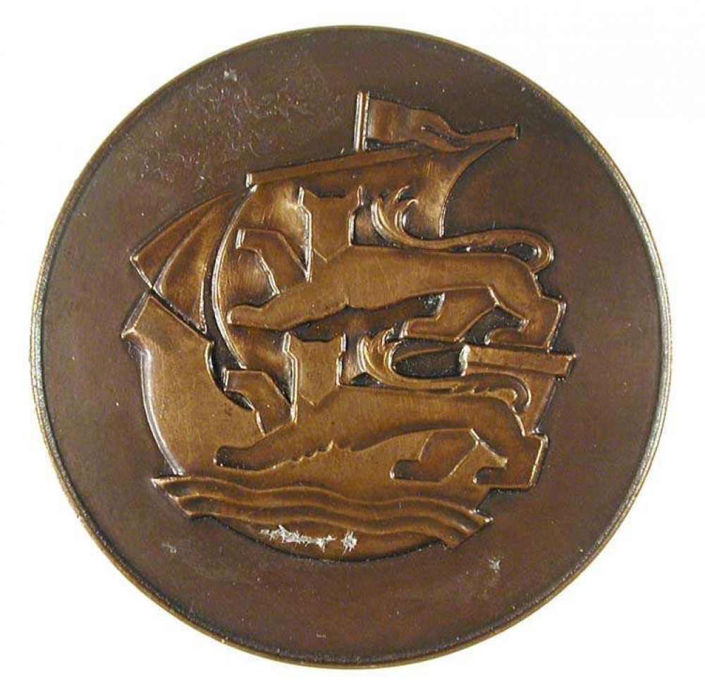 Médaille sportive du journal Paris-Normandie. 