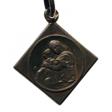 Bracelet avec deux médailles religieuses. 