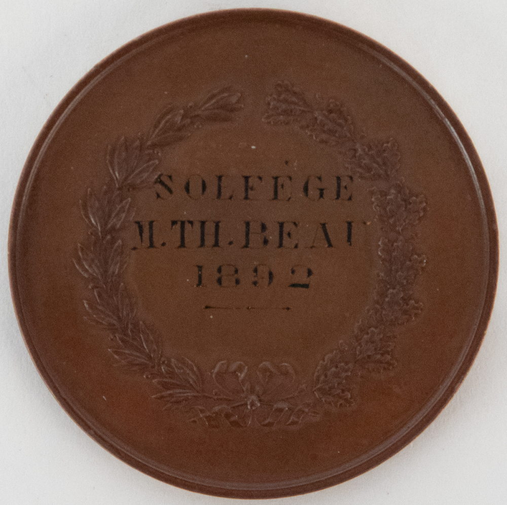 Médaille de prix de solfège du Cours d'émulation à Paris. 