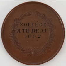 Médaille de prix de solfège du Cours d'émulation à Paris.