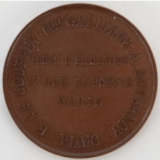 Médaille de prix de solfège du Cours d'émulation à Paris. 